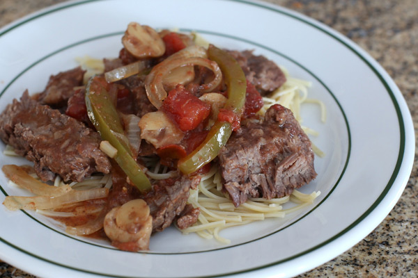 steak with peppers